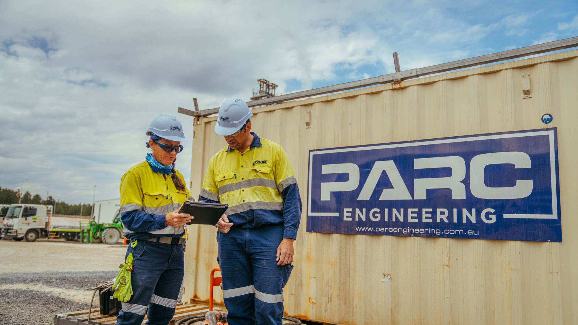 PARC tradies in fron of PARC Engineering container on site